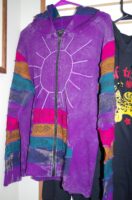 Multi-Color charity Shirt feeds 25 dogs when purchased