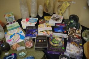 A quick photo showing some of the books and card decks and of course Selenite tower lamps too